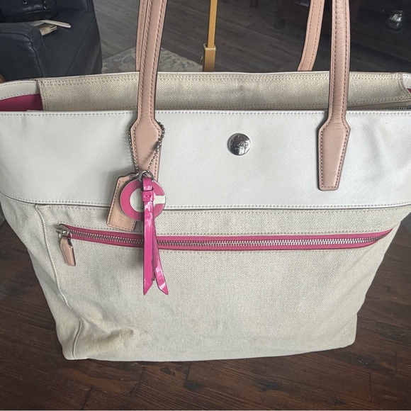 Coach Handbags - Coach Beige and Pink Canvas/leather Weekender Tote 20x15 Includes Triple hangtag